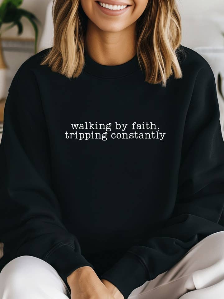 Walking By Faith Tripping Constantly Graphic Sweatshirt and other Purchase Wholesale walk by faith. Free Returns & Net 60 Terms on Faire trending on Faire.