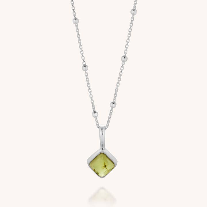 Collier avec pierre de naissance en diamant August pour la vente par Nellou