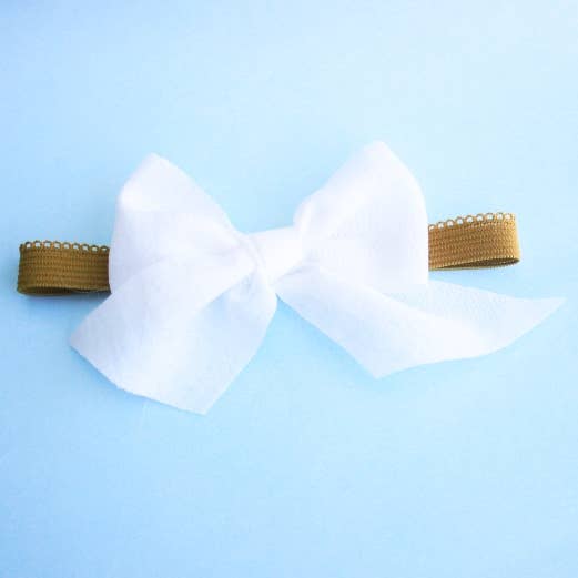 Baby-Stirnband mit weicher weißer Schleife für den Großhandel von Heidy Berry