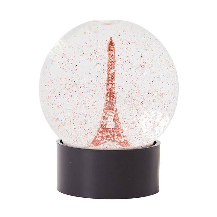 Glass snow globes with Eiffel Tower and copper glitter for wholesale by Les Parisettes