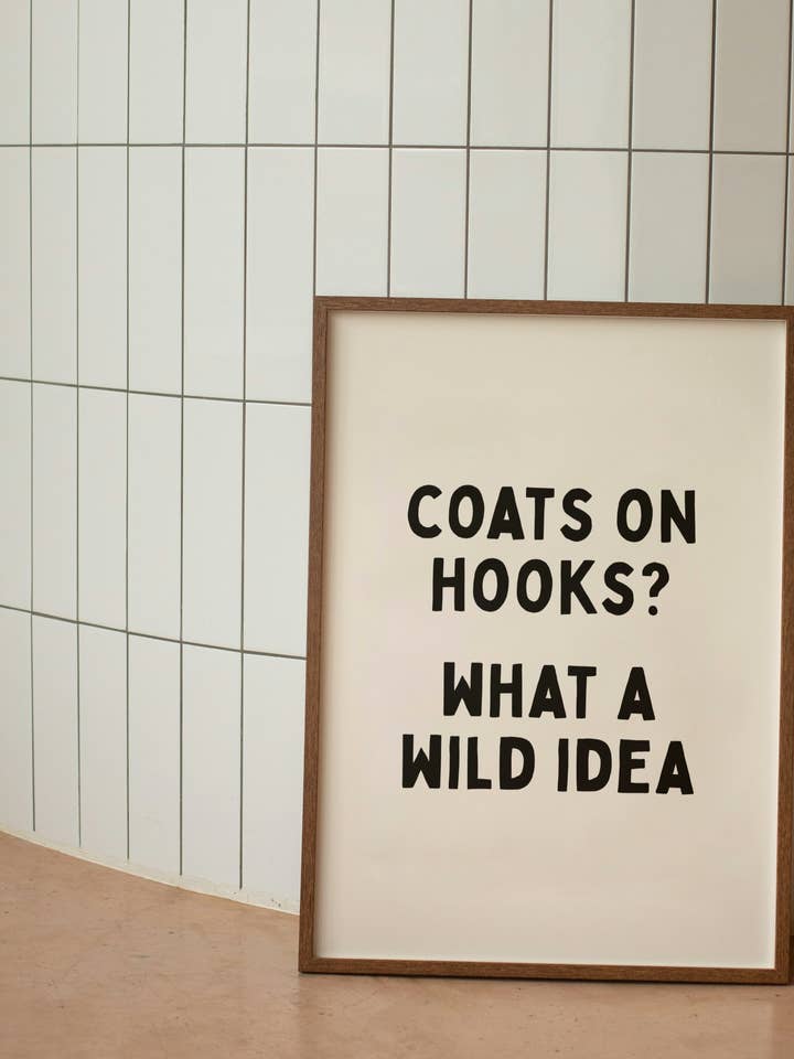 WISDOM & WONDER X HEY WONDER | Coats On Hooks? What A Wild Idea | Black and Cream | Wall Art Print for wholesale by Wisdom and Wonder Designs