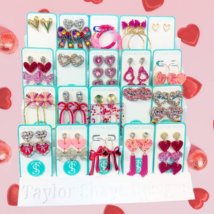 White TS Earring Display for wholesale on Faire
