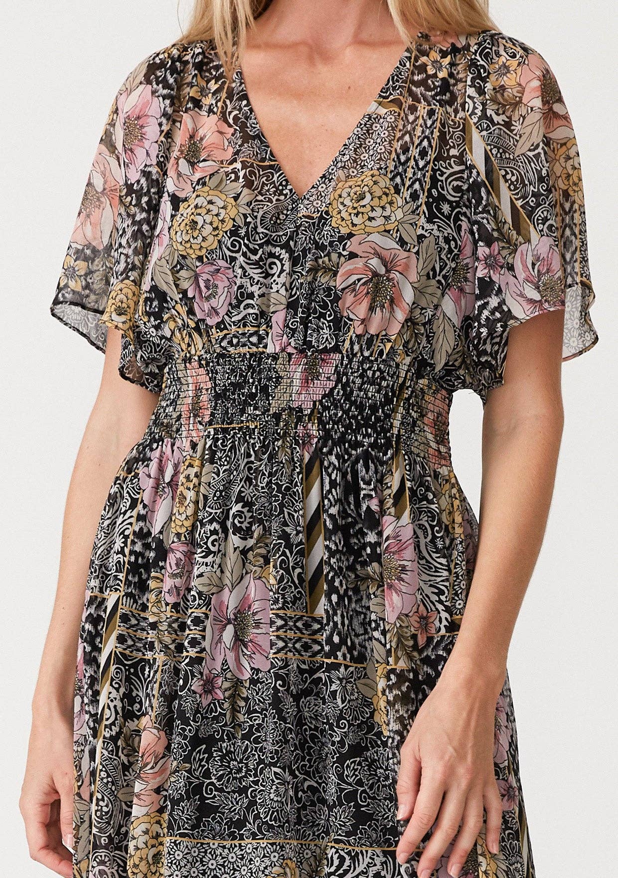 Black Dusty Peach Flowy Asymmetrical V Neck Smocked Maxi Dress for wholesale on Faire3