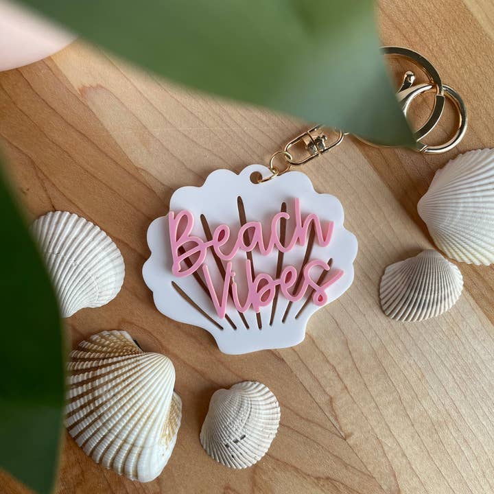 Beach Vibes Seashell Acrylic Keychain with Gold Features and other Purchase Wholesale beach vibes. Free Returns & Net 60 Terms on Faire trending on Faire.