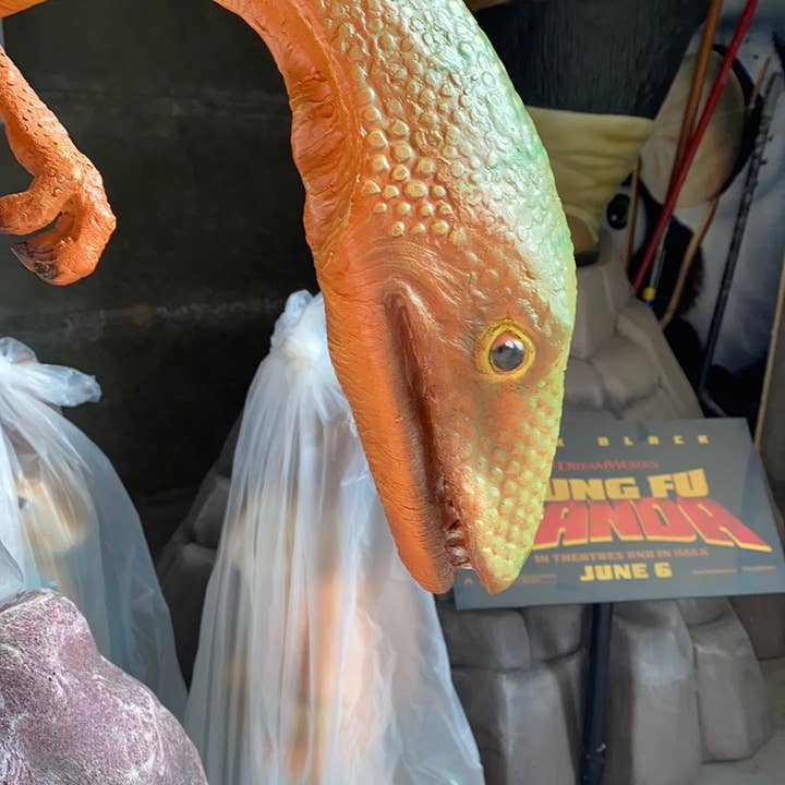 LM Treasures - Wholesale Figurine Toy - Kids - Compsognathus Dinosaur On Rock Life Size Statue