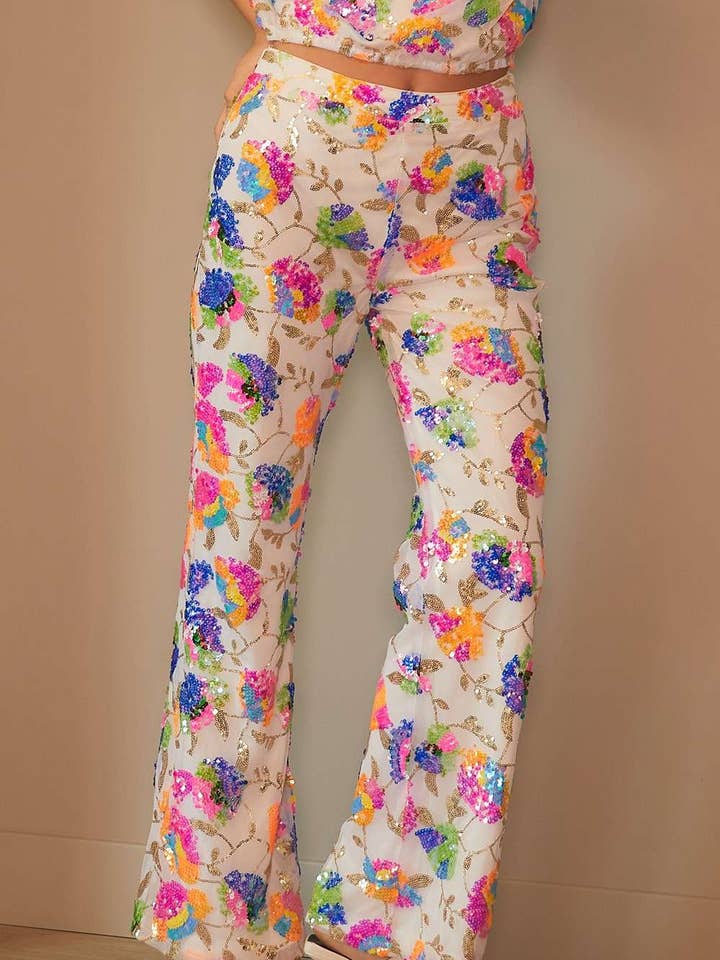 Lange Hose mit Stiefelschnitt und Paillettenblumen für den Großhandel von Main Strip