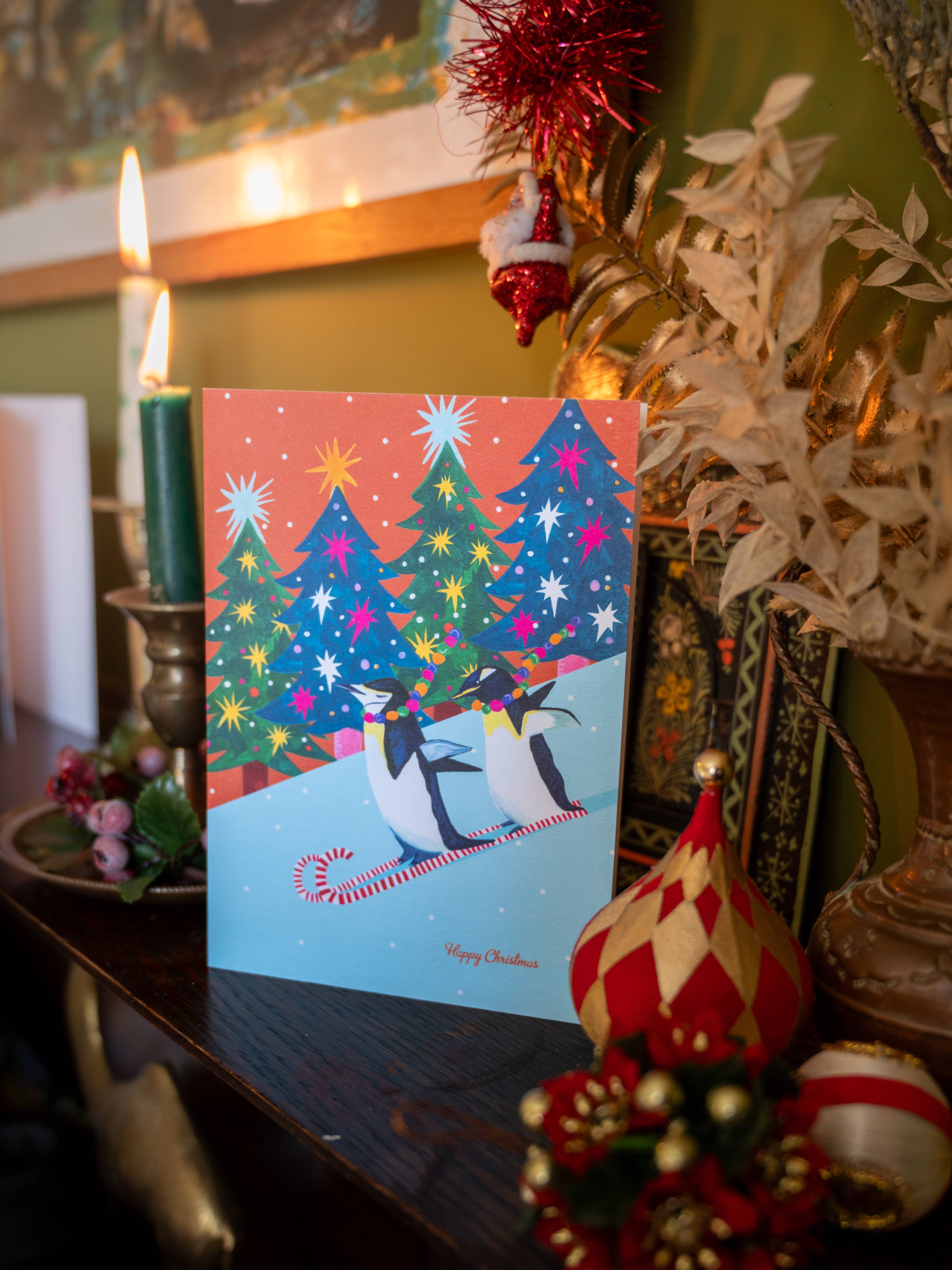 Hutch Cassidy (Greetings Cards and Paper Goods) – wholesale Christmas card – 'Penguin Race' Christmas Greetings Card2