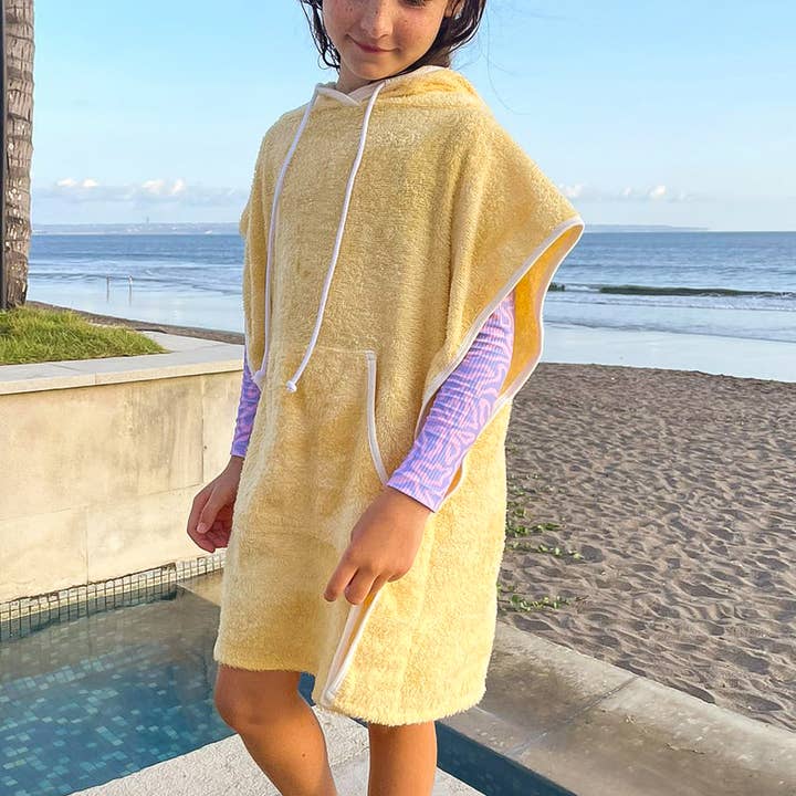 Poncho Towel for wholesale by Cosmo Crew