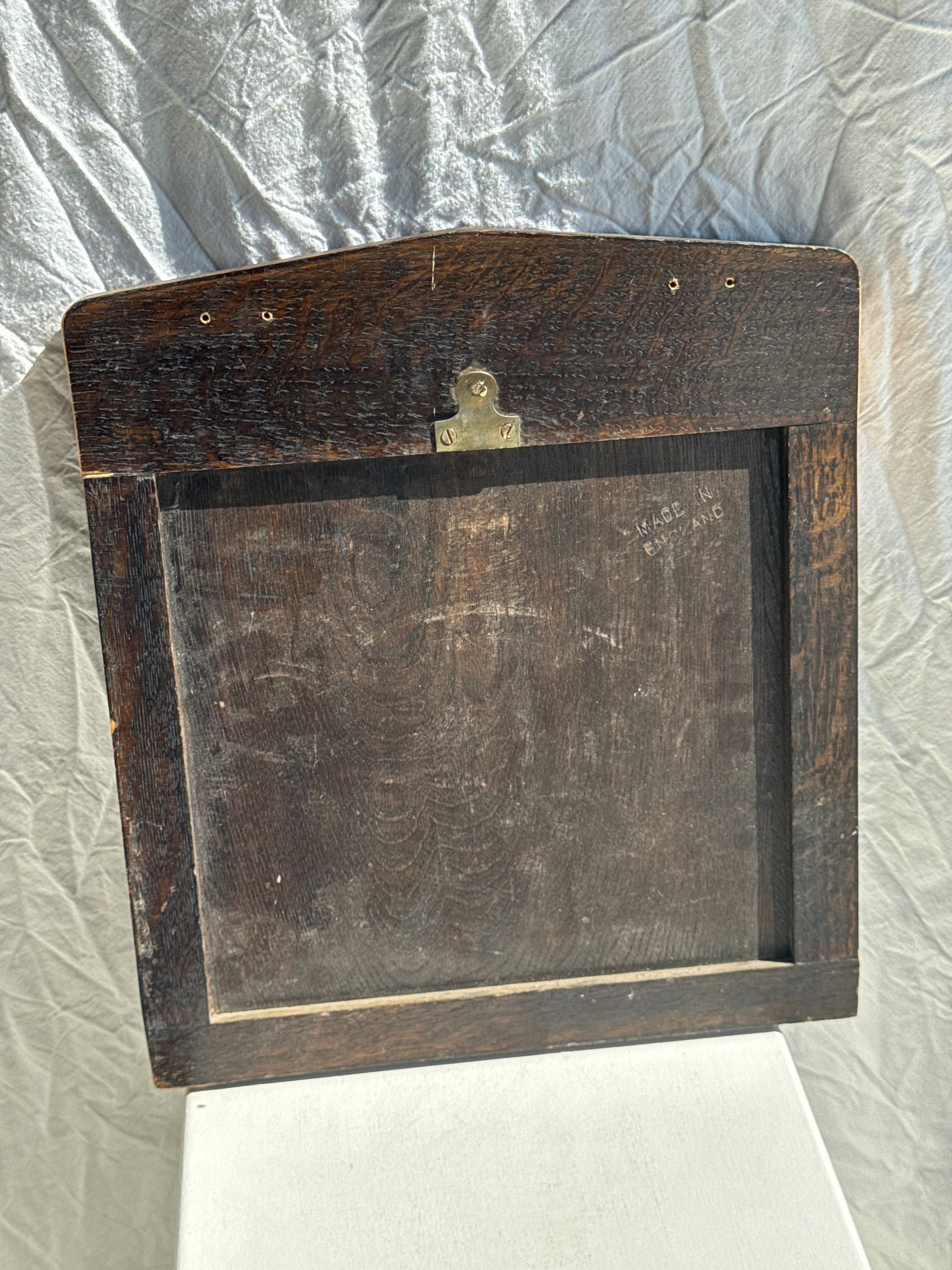 Brown Small antique English rectangular mirror with pediment for wholesale on Faire7