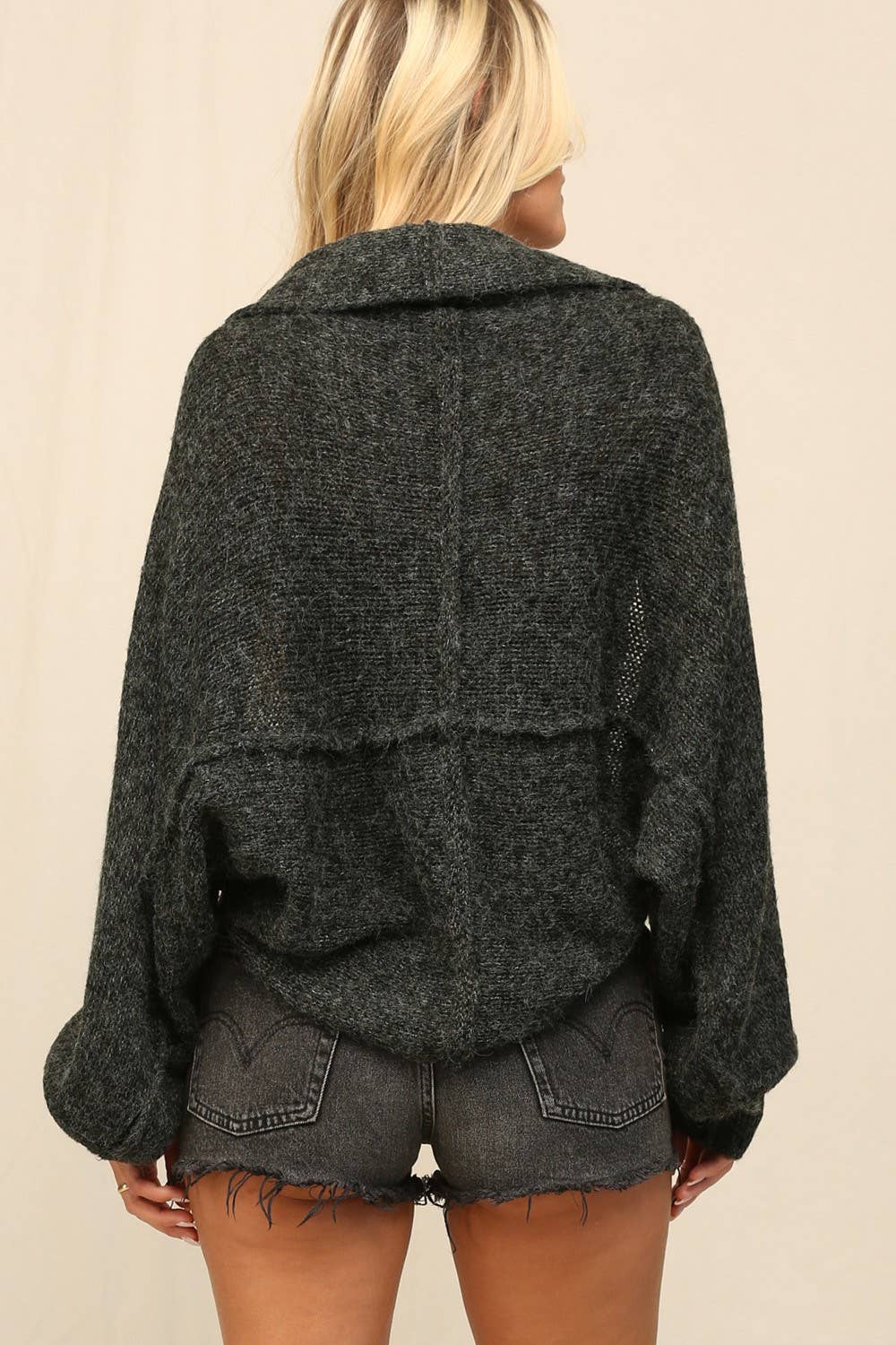 Black The Shrug Is Featured In A Slouchy,Relaxed Fit for wholesale on Faire8