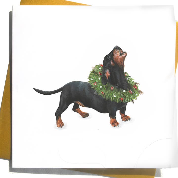 Julekort med gravhund og krans «Happy Howlidays» for engroshandel hos Hannah Farrs