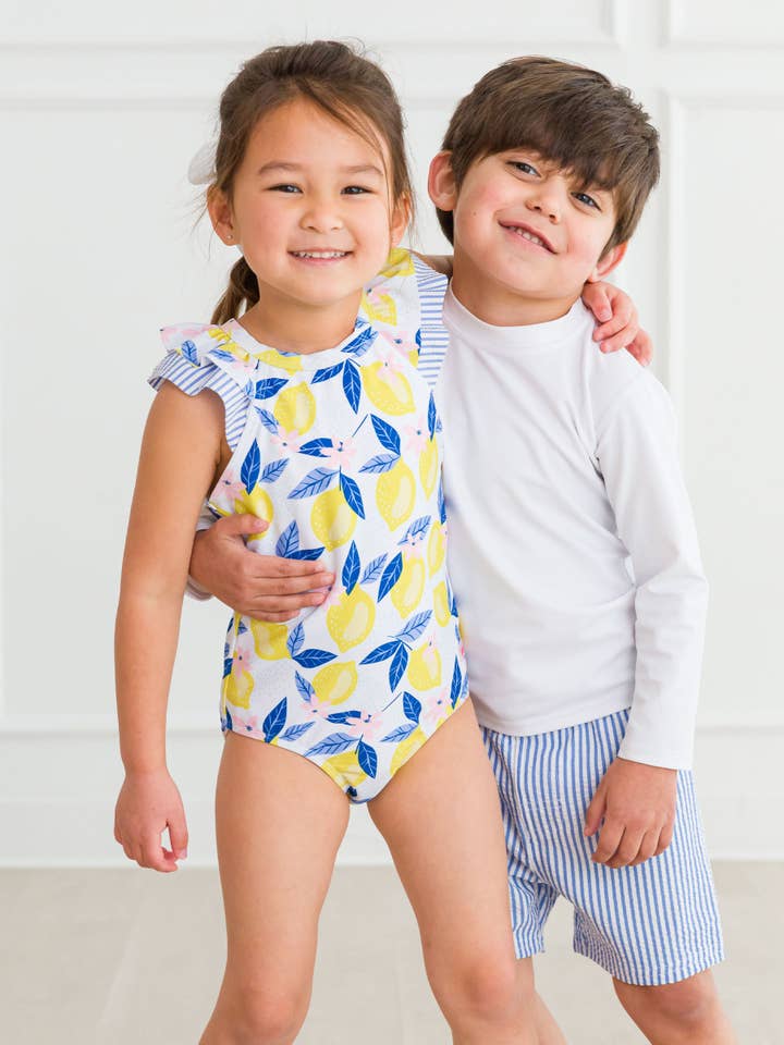 Yellow Girls Lemon Capri Bow V-Back One Piece Swimsuit
for wholesale on Faire8