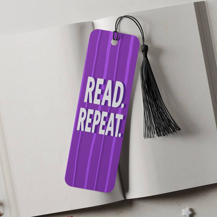 DaisyChainDesignCo - Wholesale Bookmark - Read Repeat Aluminum Metal Bookmark