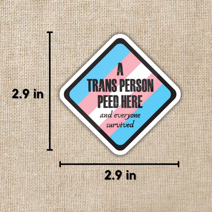 Kingdom of Threads - Wholesale Sticker - A Trans Person Peed Here Sticker