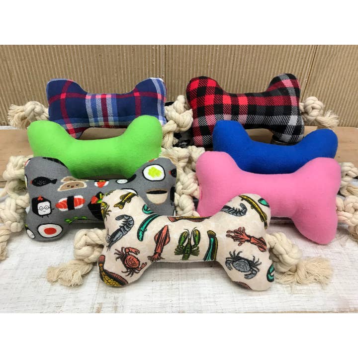 Dog bone toy with squeaker and cotton rope and other Purchase Wholesale filled dog bones. Free Returns & Net 60 Terms on Faire trending on Faire.