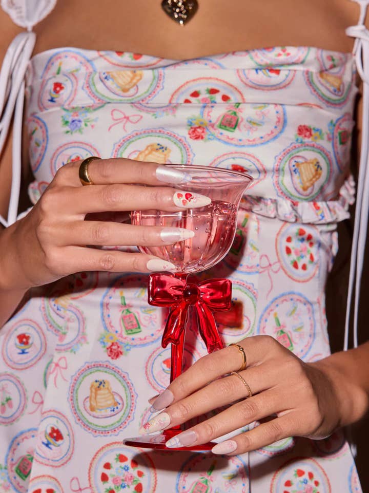 FLORAL FEMME- ALMOND PRESS-ON NAILS for wholesale by Never Have I Ever