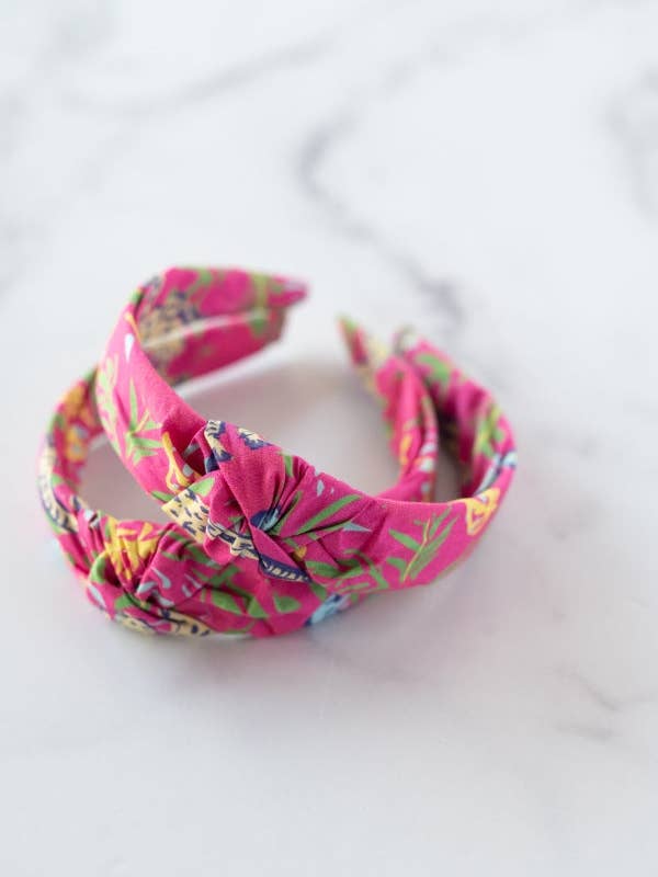 Det lille kvast pandebånd i varm pink safari for engroshandel hos The Tiny Tassel