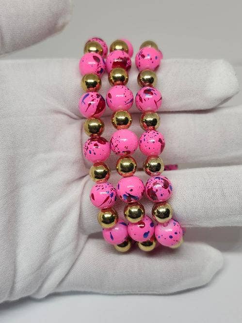 2-Hot Pink Custom Painted Glass Bead Stretchy Bracelets for wholesale by Paradise Island Gold and Silver