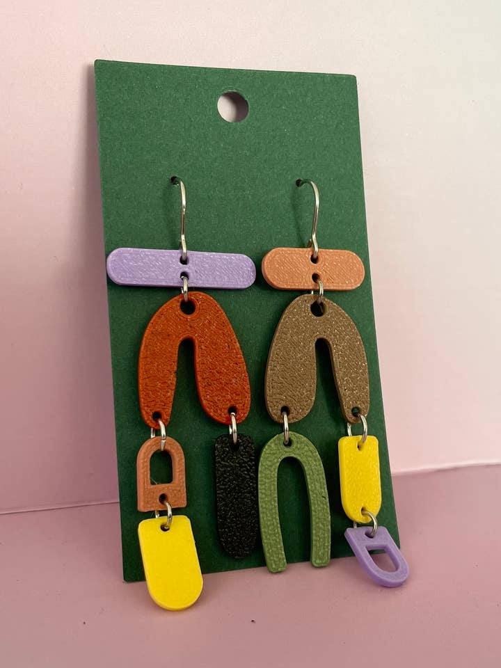 Pendientes colgantes asimétricos ligeros llamativos para venta al por mayor de Pineapple Phi