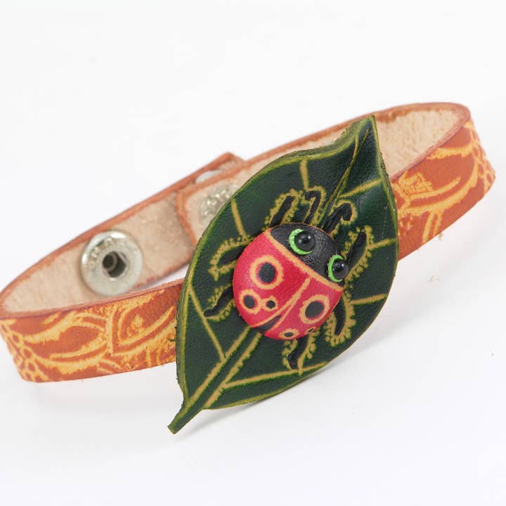 Handmade Heather Ladybug on Leaf Bracelet for wholesale by Sunflower Handmade leather inc