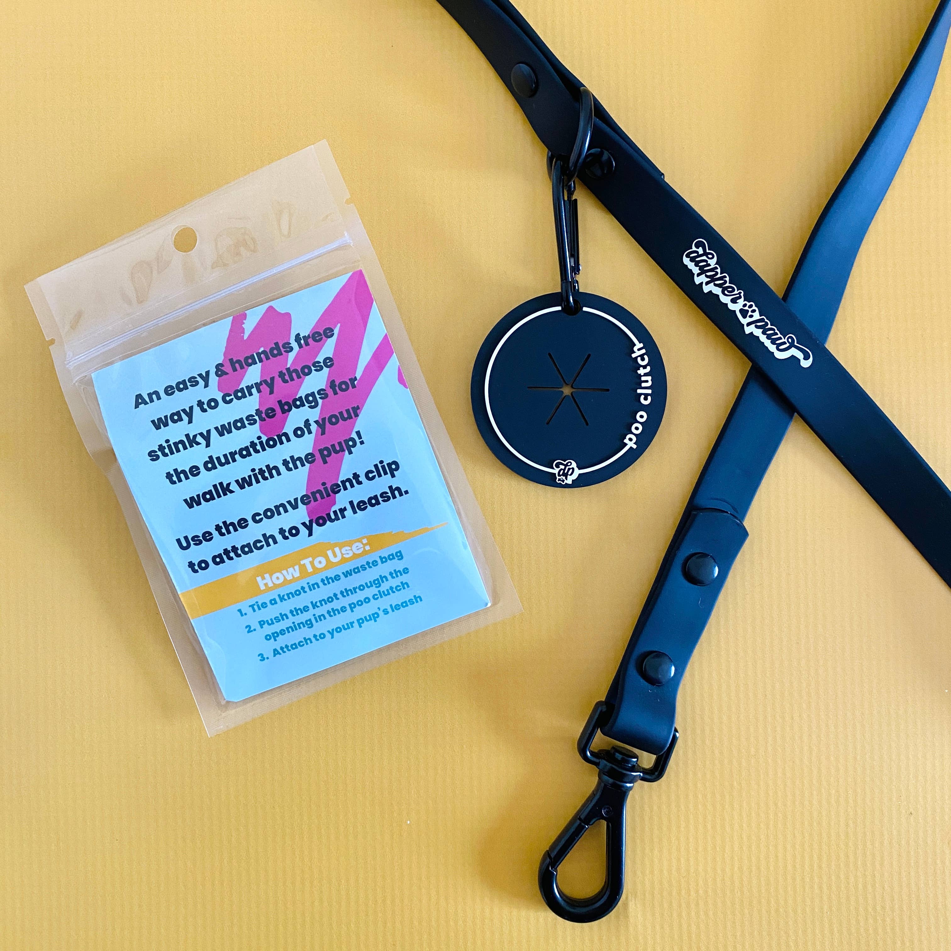 The Dapper Paw - Wholesale Pet Poop Bag - Poo Clutch - Hands Free Way to Carry Pup's Poo! (4 Colors)1