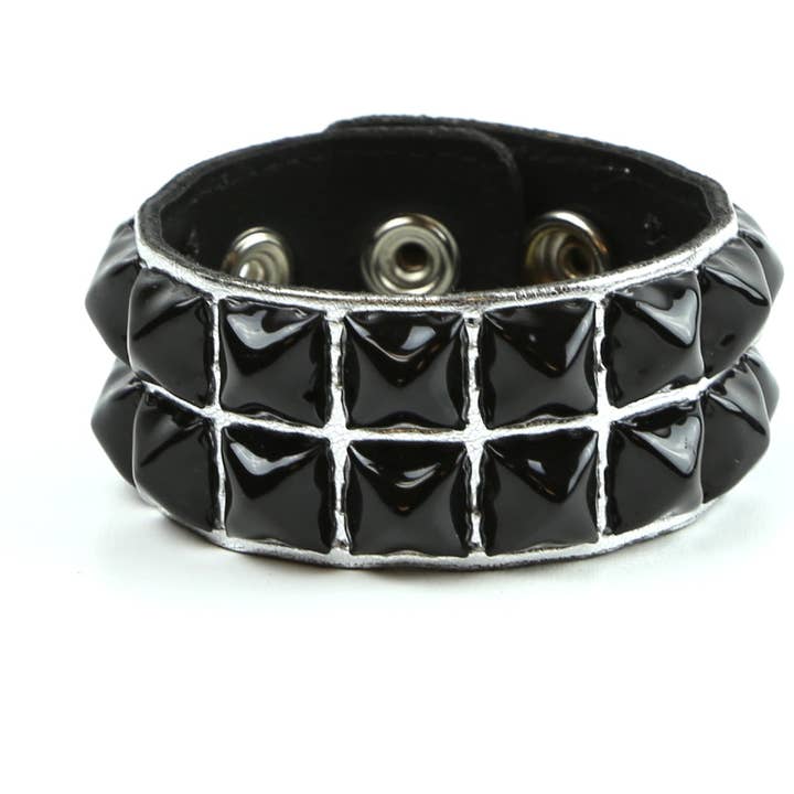 BC112P-SIL-BS SILVER PATENT BLACK PYRAMID STUD BRACELET for wholesale by Funk Plus
