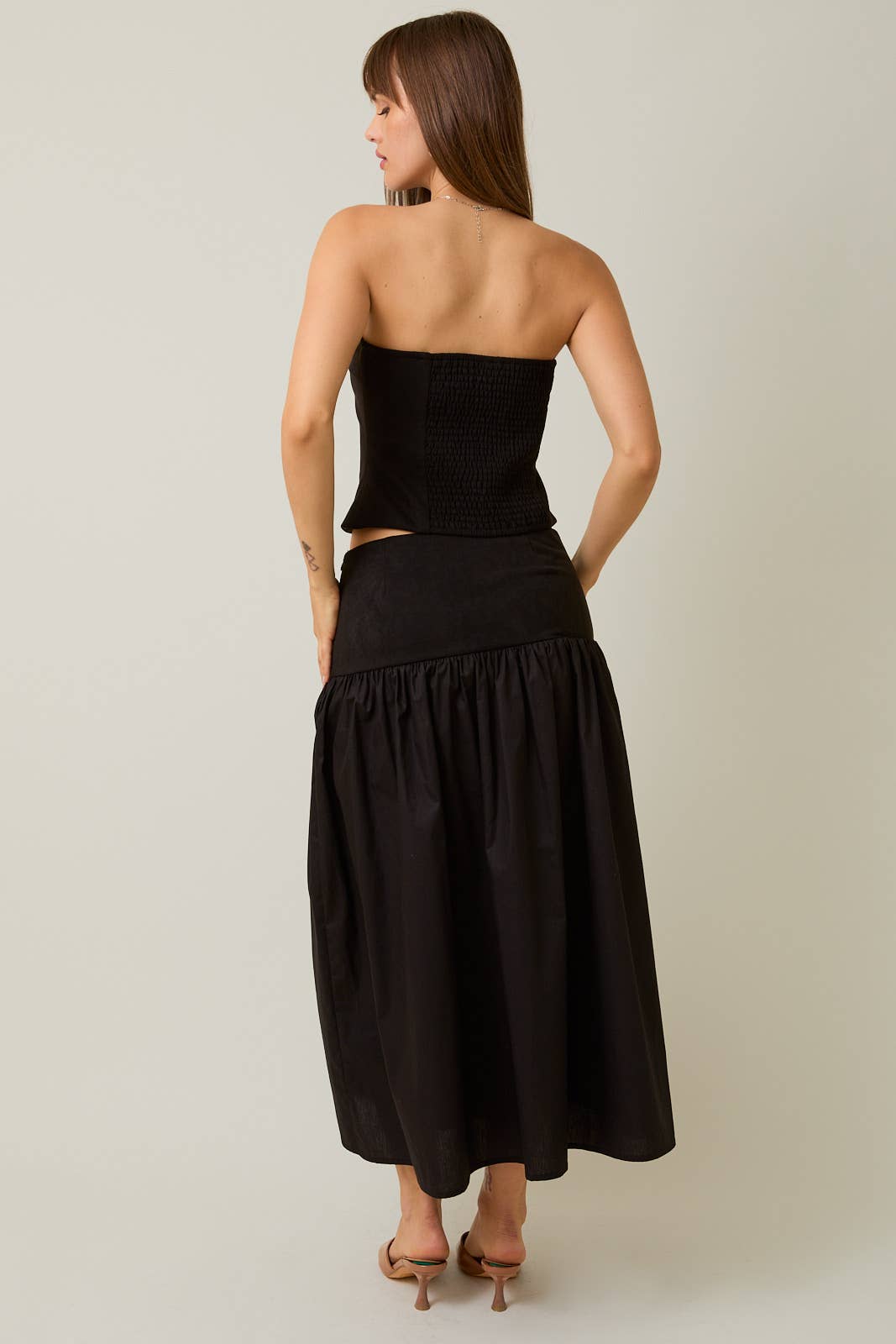 Black STRAPLESS SMOCKED BACK SUEDE TUBE TOP & CONTRAST MIDI SKIRT for wholesale on Faire3