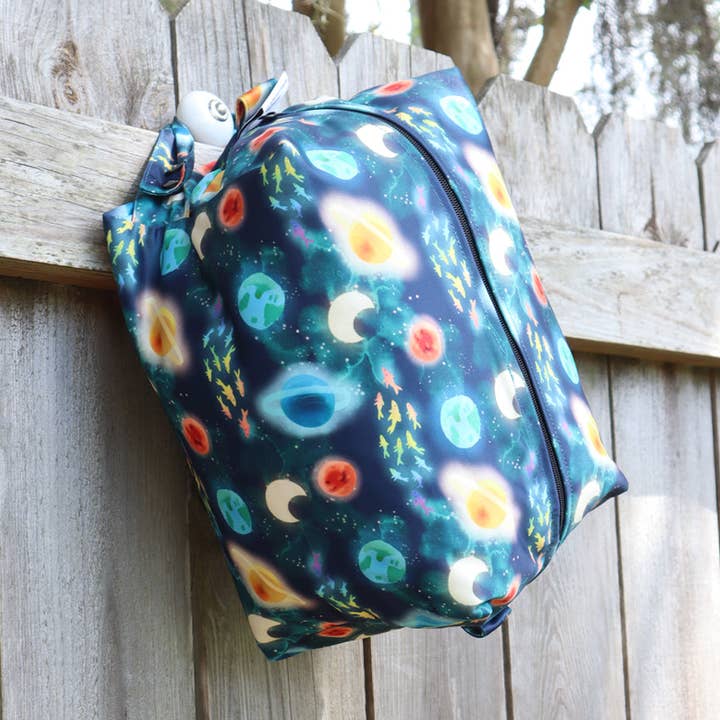 DEEP SPACE AND SEA TRAVEL POUCH for wholesale by River City Bags