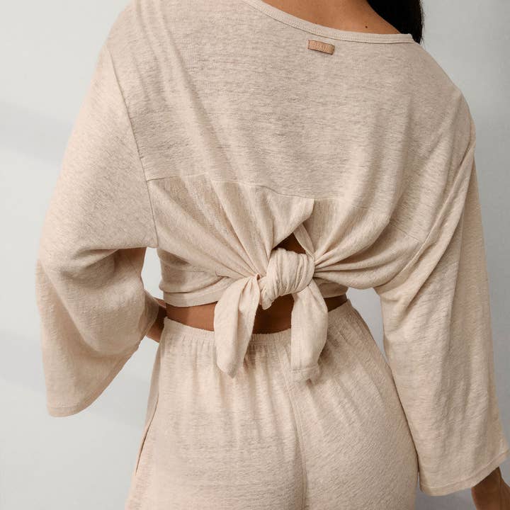 Quercia Sbadigliante Top in maglia di lino con spacco posteriore in vendita all'ingrosso su Faire