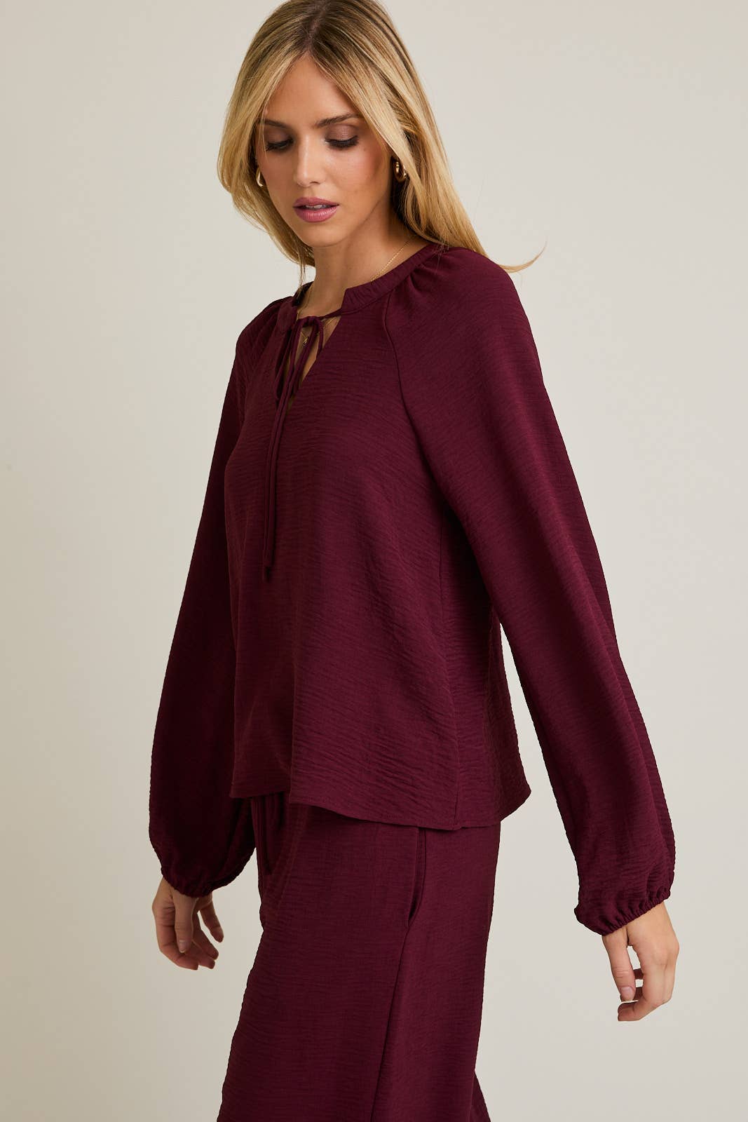 WINE FRONT TIE LONG SLEEVE TOP for wholesale on Faire1