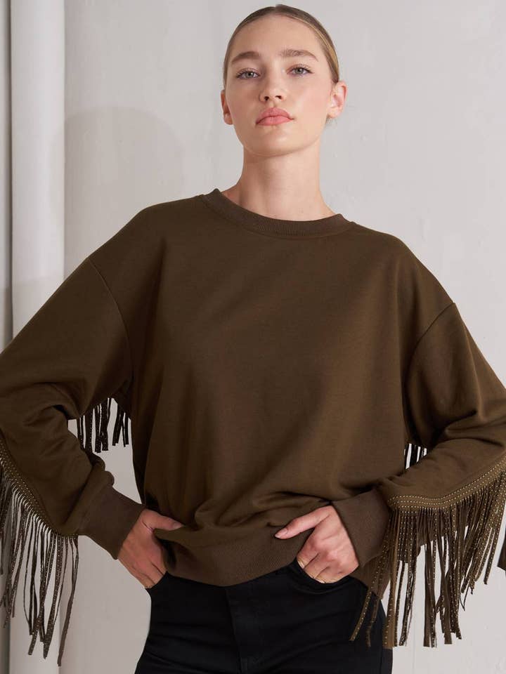 A pullover knit top - FT1661 and other Purchase Wholesale fringe sweatshirt. Free Returns & Net 60 Terms on Faire trending on Faire.