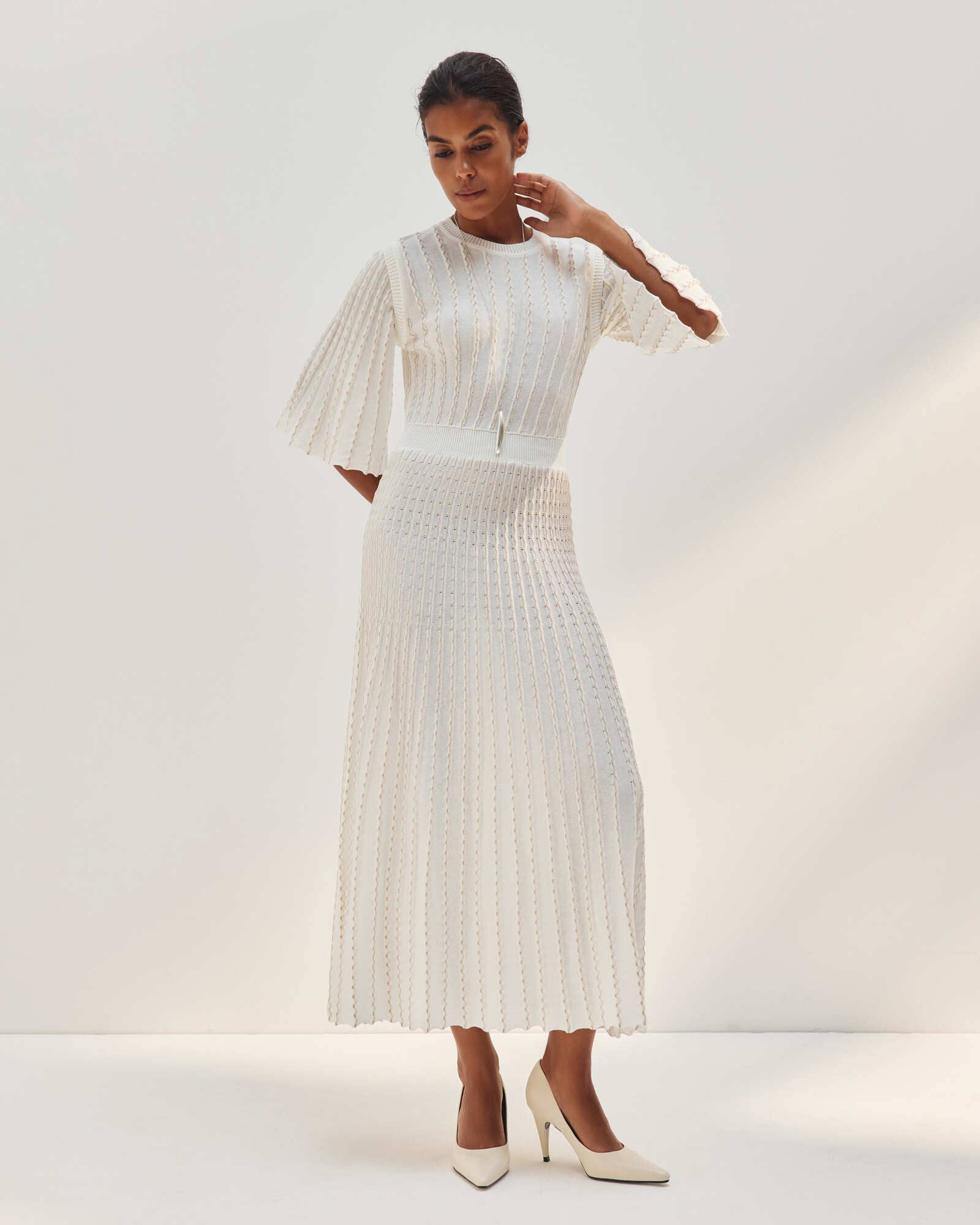 Nenya Fashion Limited – wholesale Dress – Women's – Estelle Openwork Knit Dress with Flared Sleeve6