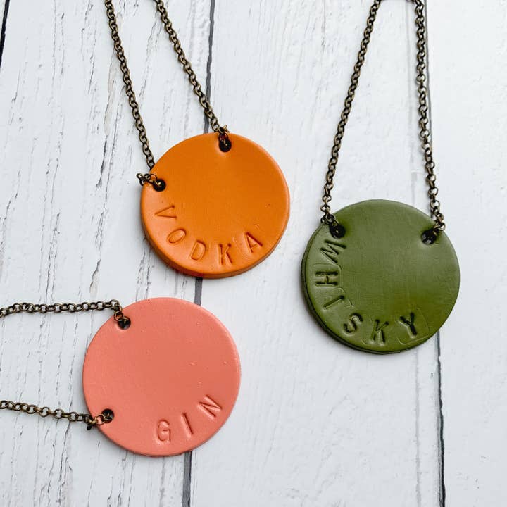 Hand stamped bottle tag for wholesale by Parkin & Lewis