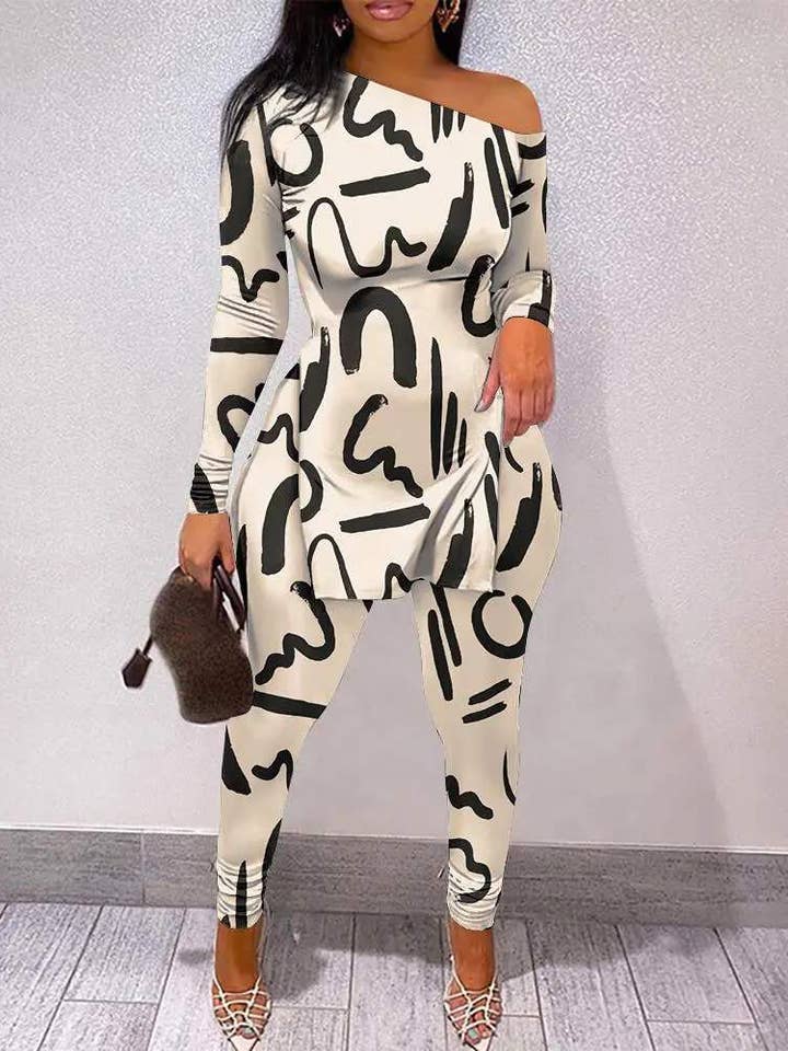 Conjunto de calças de manga comprida com bainha dividida com estampa toda por atacado de Queen Fashion