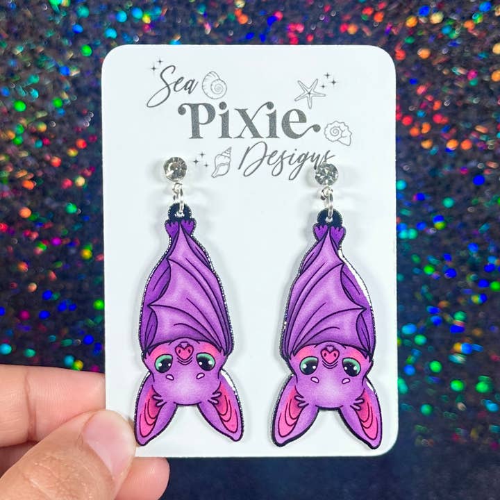 Cute Upside-Down Purple Bat Halloween Dangle Earrings for wholesale by Sea Pixie Designs