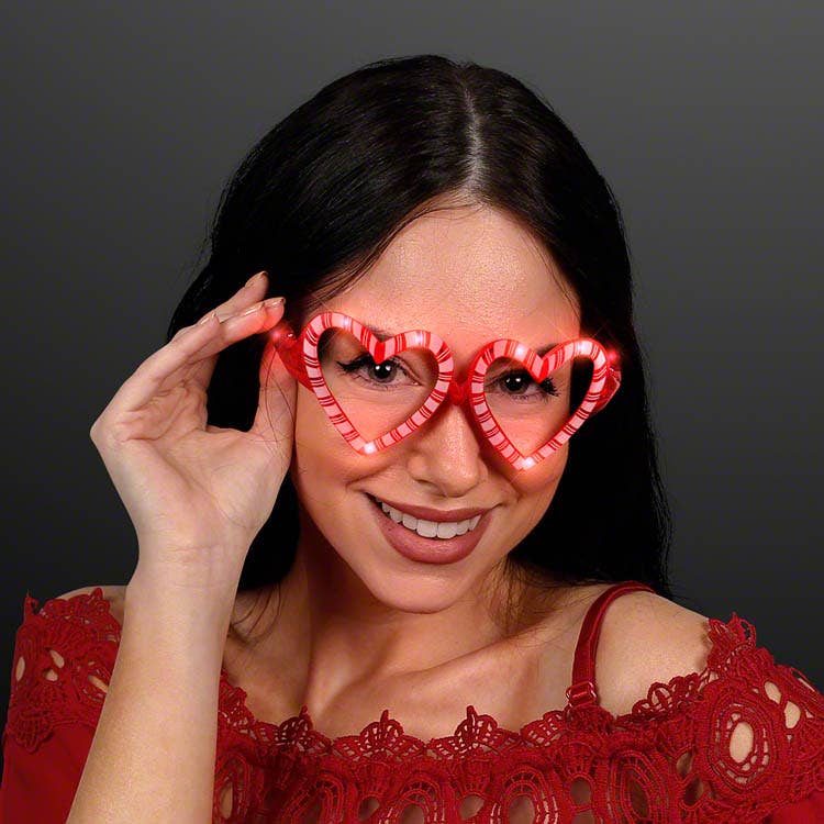 Blinkee.com, LLC - Wholesale Sunglasses - Unisex - Light Up Heart-Shaped Candy Cane Holiday Sunglasses1