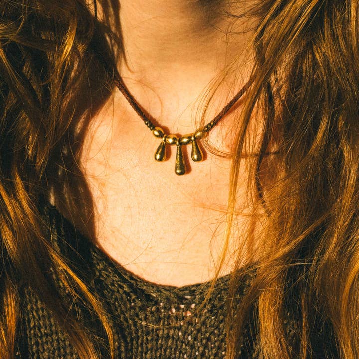 Brass & leather necklace with 3 drop chams » Handmade for wholesale by Nomadu