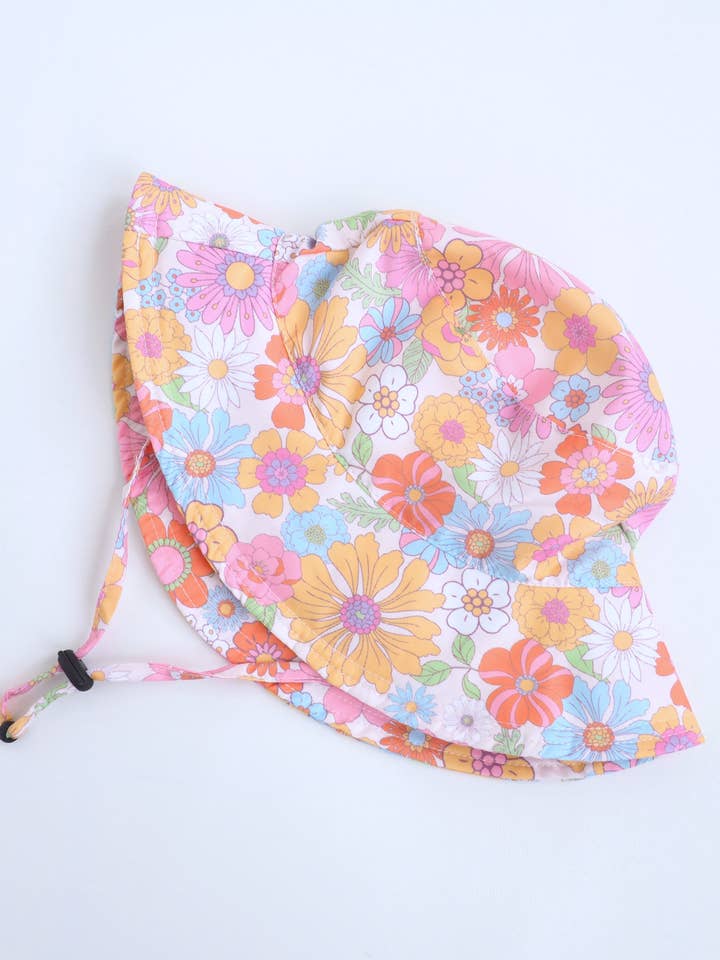 Chapeaux pour bébés et enfants - Rétro floral pour la vente par Sungrubbies