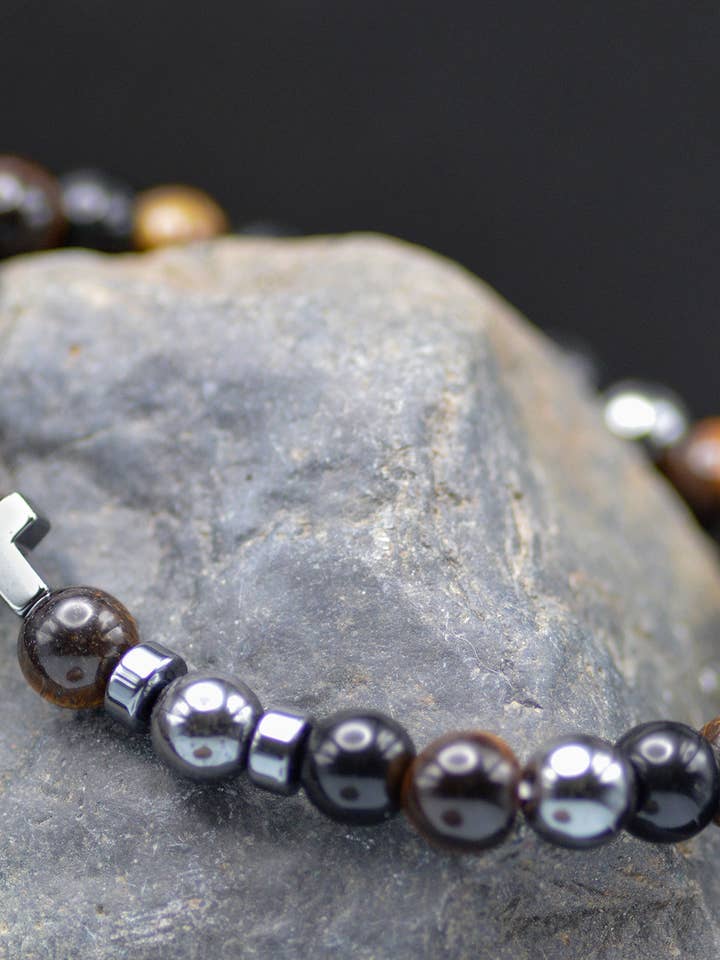 Pulseira Eden Merry com Cruz de Contas e Cartão de Oração Olho de Tigre por atacado de Eden Merry Jewelry by James Lawrence