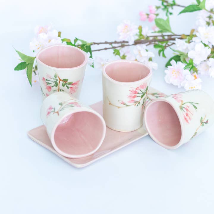 Tumbler Cups- Handmade pottery cups with pressed flower for wholesale by Tara Kothari