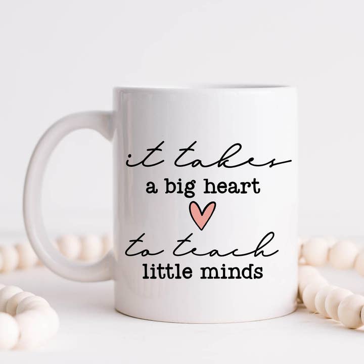 Teach - Tazza da caffè con scritta in lingua inglese «It takes a big heart to teach per la vendita all'ingrosso da parte di Hm Mugs