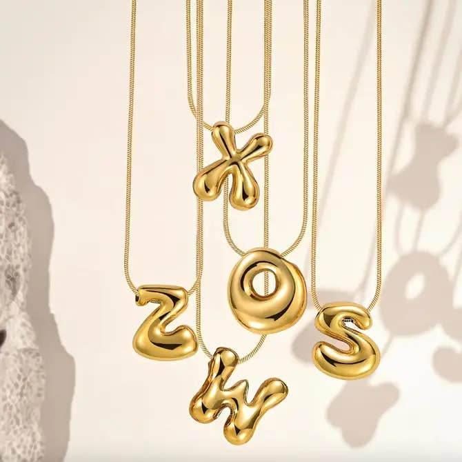 57 Bubble Letter Necklaces Pack for wholesale by Trend & Co