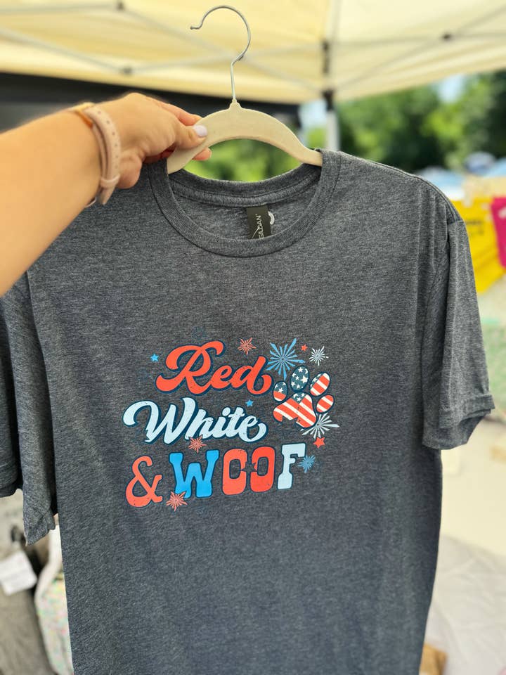 Fourth of July, red, white and woof Tshirt. for wholesale by Walking Paws Boutique