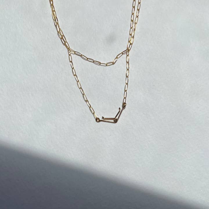 Collana con gancio e catena per la vendita all'ingrosso da parte di Cinq