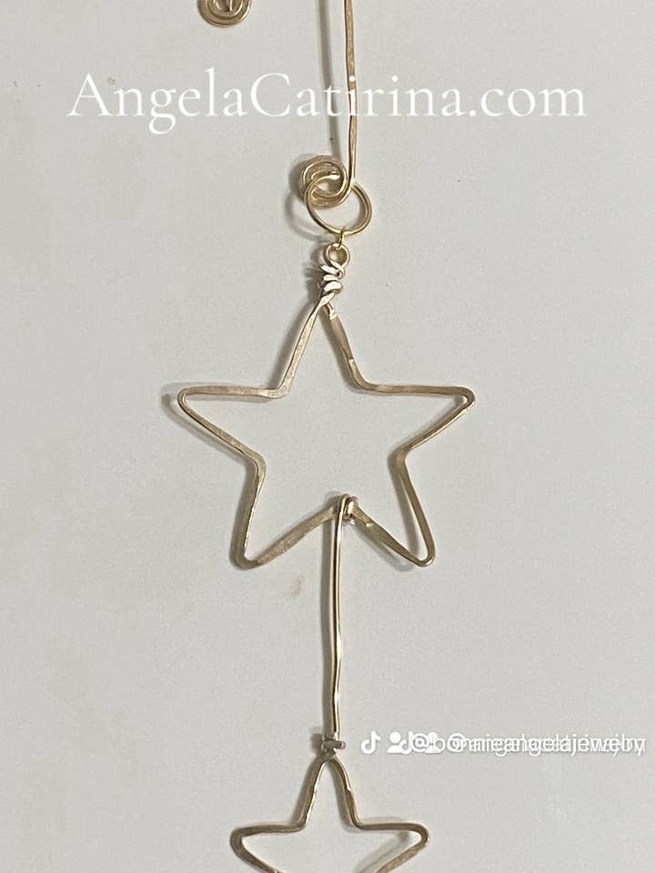 Shooting Stars Christmas Ornament for wholesale by Angela Catirina Jones