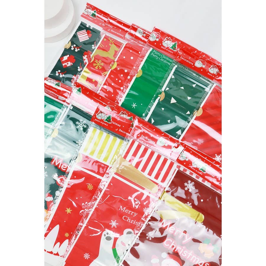MULTI Christmas Theme Draw String Gift Bag for wholesale on Faire8
