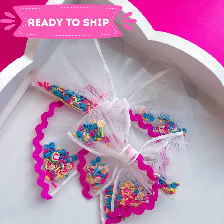 Summer Pool Party Shaker Bow for wholesale by Sparkling New Baby, LLC.