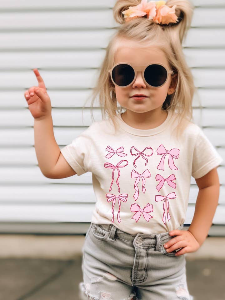 Trendy bow T-shirt coquette girl for wholesale by Buckin Baby Wholesale