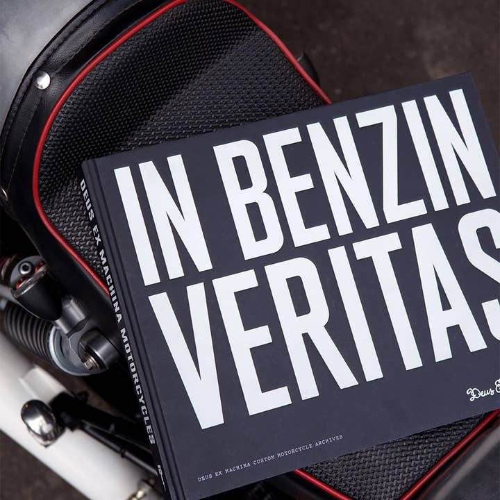 Black IN BENZIN VERITAS - The History of Deus Custom Motorcycles for wholesale on Faire