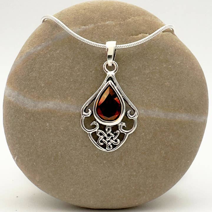 Endless Grace Garnet Pendant in Sterling Silver for wholesale by The Green Gecko